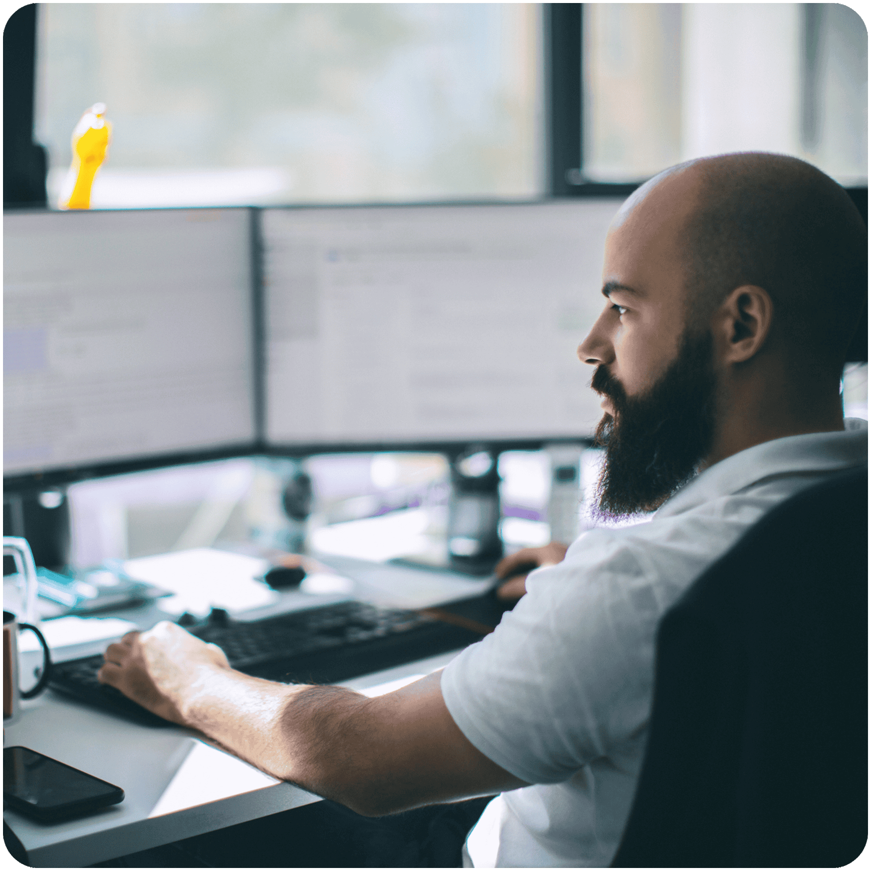 digital accessibility professional working at desk